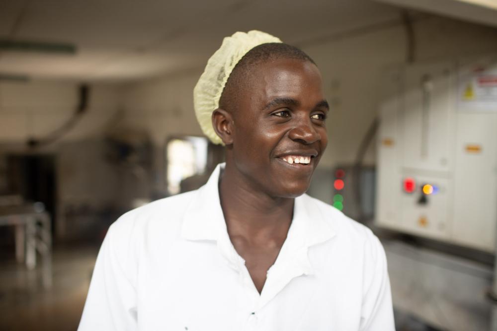 Man smiling with hair net on